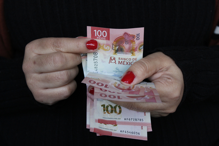 Woman counting pesos